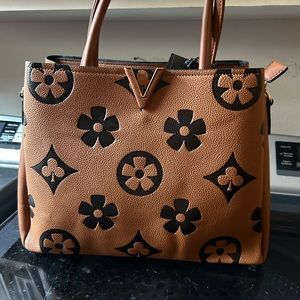 Brown and tan satchel purse.